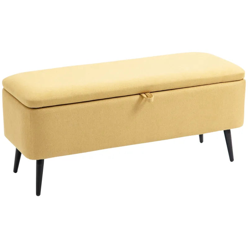 Banquette coffre scandinave jaune avec assise rembourrée et espace de rangement, design moderne et élégant.