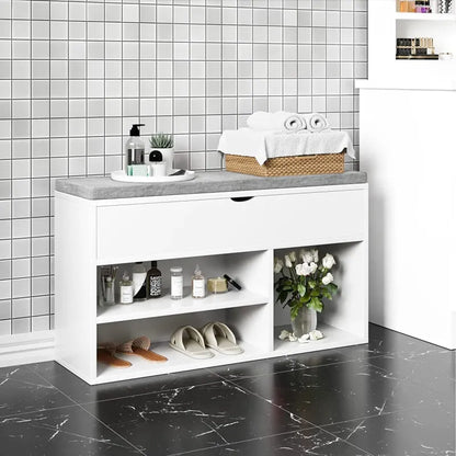 Banc à chaussures avec coussin de Maison Banc, design compact avec rangements astucieux pour chaussures et accessoires.