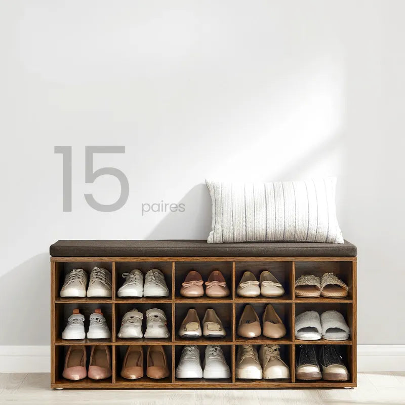 Banquette à chaussures design rustique avec coussin et 15 compartiments de rangement, en bois marron clair, style décoratif.
