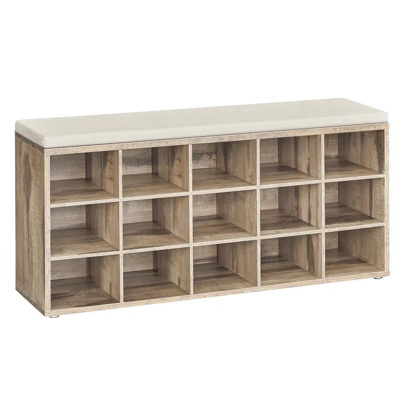 Banc à chaussures design scandinave avec assise rembourrée marron et 9 compartiments de rangement.