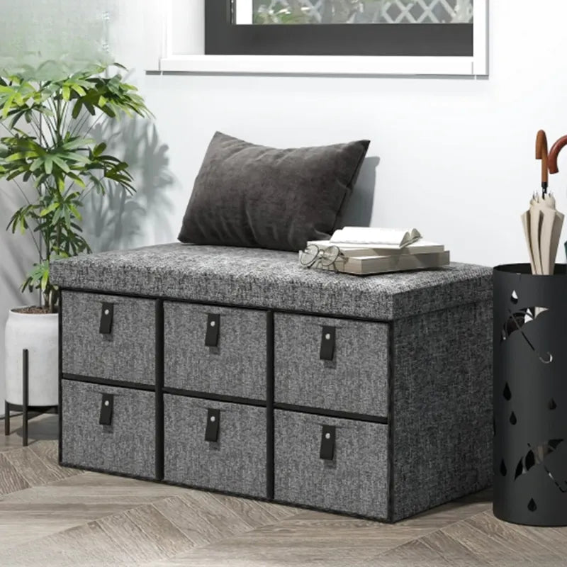 Banc à chaussures rembourré gris avec design moderne et 6 tiroirs de rangement, par Maison Banc.