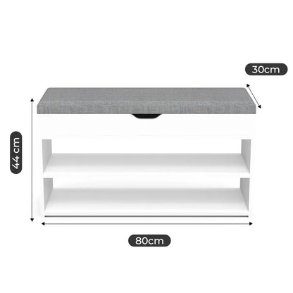 Banc à chaussures Scandinave blanc et gris avec trois niveaux de rangement et coussin de confort, design moderne et pratique.