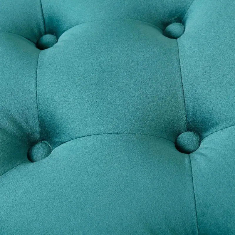 Banc bout de lit en velours vert et bleu, rembourré, design minimaliste de la marque Maison Banc, idéal pour décoration intérieure.
