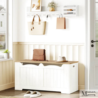 Banc coffre de rangement moderne blanc avec design minimaliste, parfait pour un espace élégant et pratique.