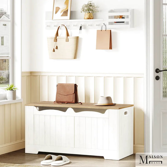 Banc coffre de rangement moderne blanc avec design minimaliste, parfait pour un espace élégant et pratique.