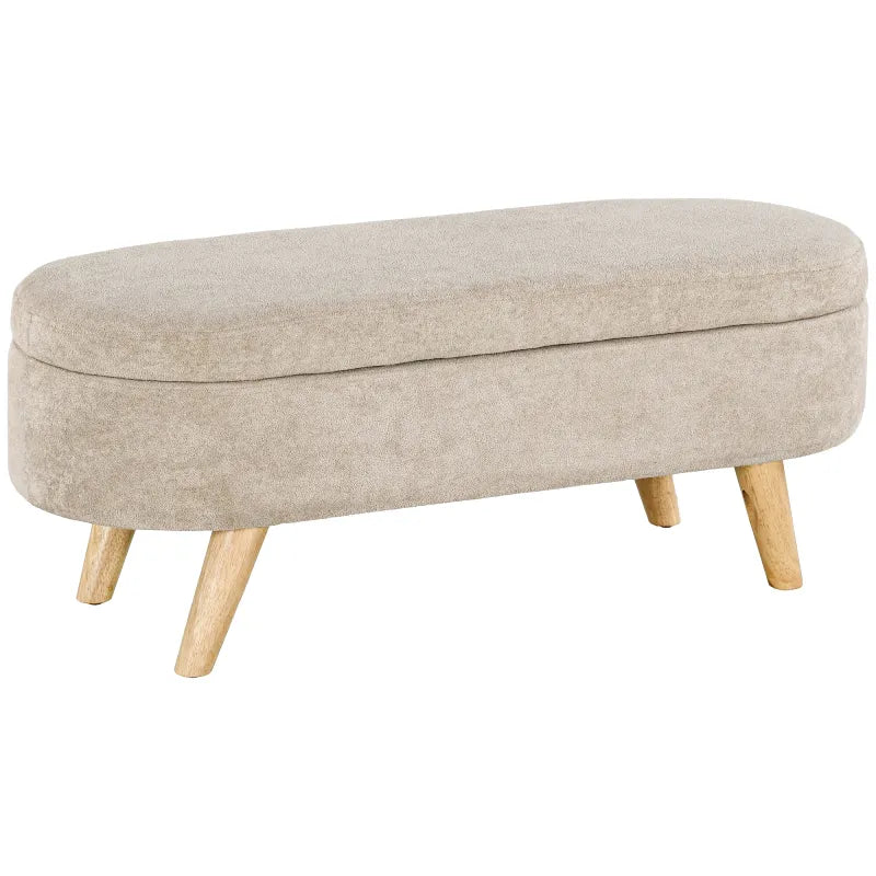 Banc coffre de rangement ovale en velours beige signé Maison Banc, design scandinave élégant, idéal pour salon ou chambre