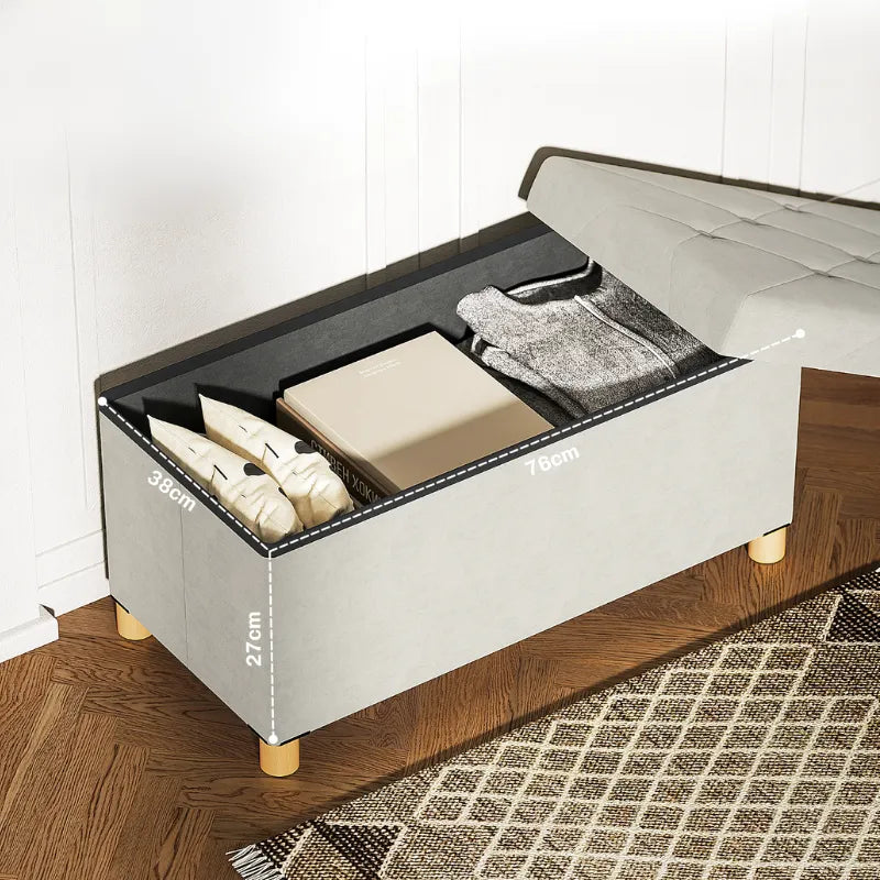 Banc coffre de rangement pliable en velours crème avec design scandinave élégant, parfait pour un intérieur moderne et pratique.