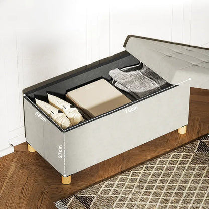 Banc coffre de rangement pliable en velours crème avec design scandinave élégant, parfait pour un intérieur moderne et pratique.