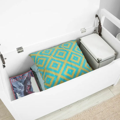 Banc coffre d'entrée Scandinave blanc avec coussin gris et espace de rangement discret, design moderne et épuré.