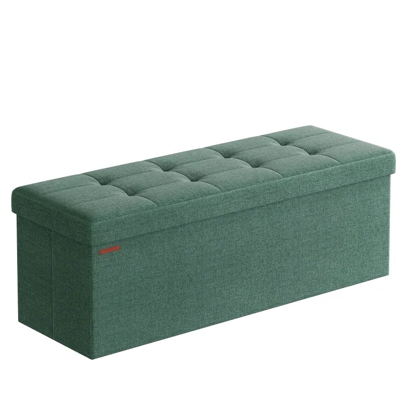 Banc coffre pliable en tissu lin vert, rangement spacieux et design élégant, idéal pour salon ou chambre.