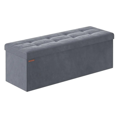 Banc coffre pliable en velours gris foncé avec 131L de rangement, design moderne scandinave, idéal pour salon ou chambre.