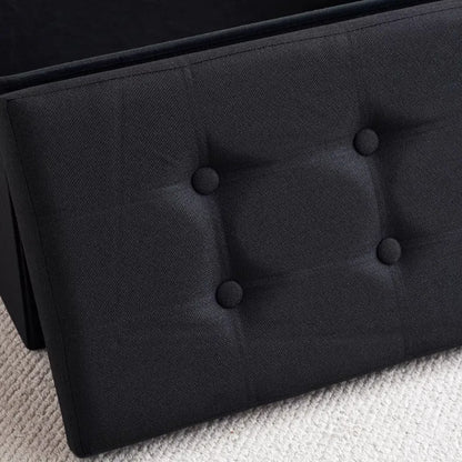 Banc coffre pliable noir avec assise confortable et design décoratif, idéal pour le rangement et la décoration intérieure.