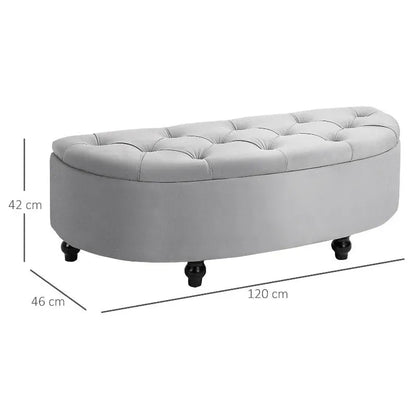 Banc coffre en velours gris avec design chic et espace de rangement discret, idéal pour décoration intérieure élégante.