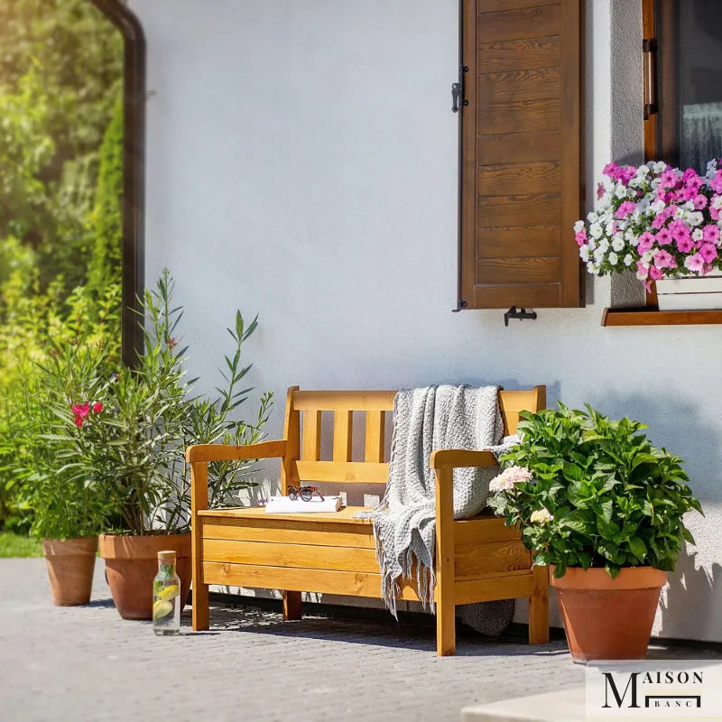 Banc de jardin en bois classique avec coffre intégré, assise confortable et espace de rangement, de la marque Maison Banc.