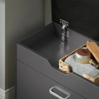 Banc de rangement pour entrée Maison Banc en gris foncé, assise confortable et design moderne pour rangement pratique.