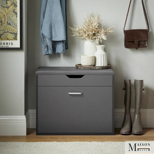Banc de rangement pour entrée design Maison Banc avec assise confortable gris foncé, moderne et pratique.