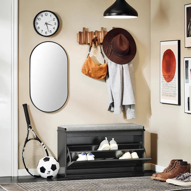 Banc d'entrée design nordique noir avec rangement à chaussures, style minimaliste et pratique, par Maison Banc.