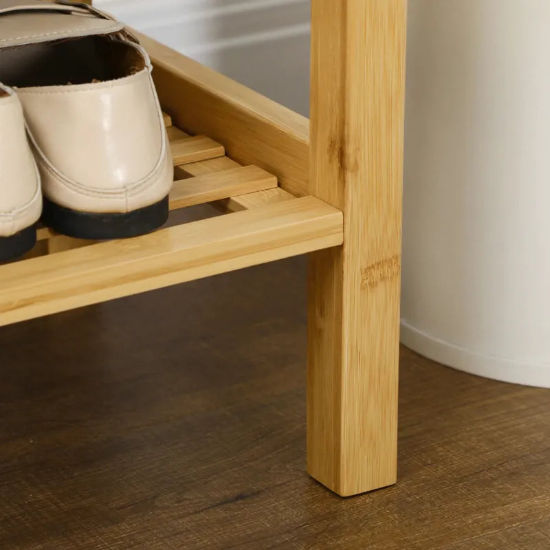 Banc d'entrée en bois de bambou avec espace de rangement pour chaussures, design scandinave, finition naturelle.
