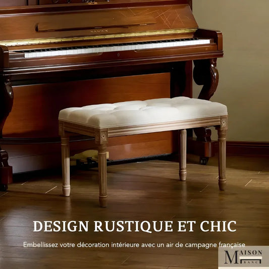 Ottoman d'entrée beige de prestige de Maison Banc avec bois sculpté et tissu en lin capitonné, design élégant et confortable.